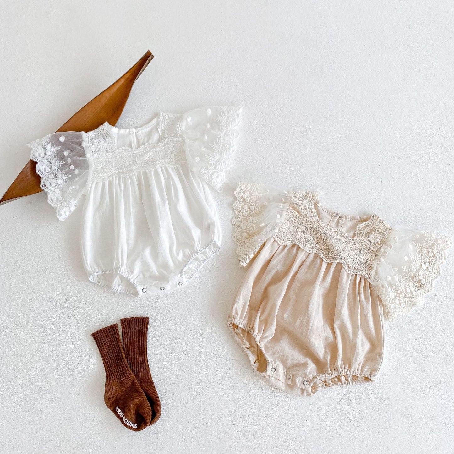 Angel lace sleeved romper